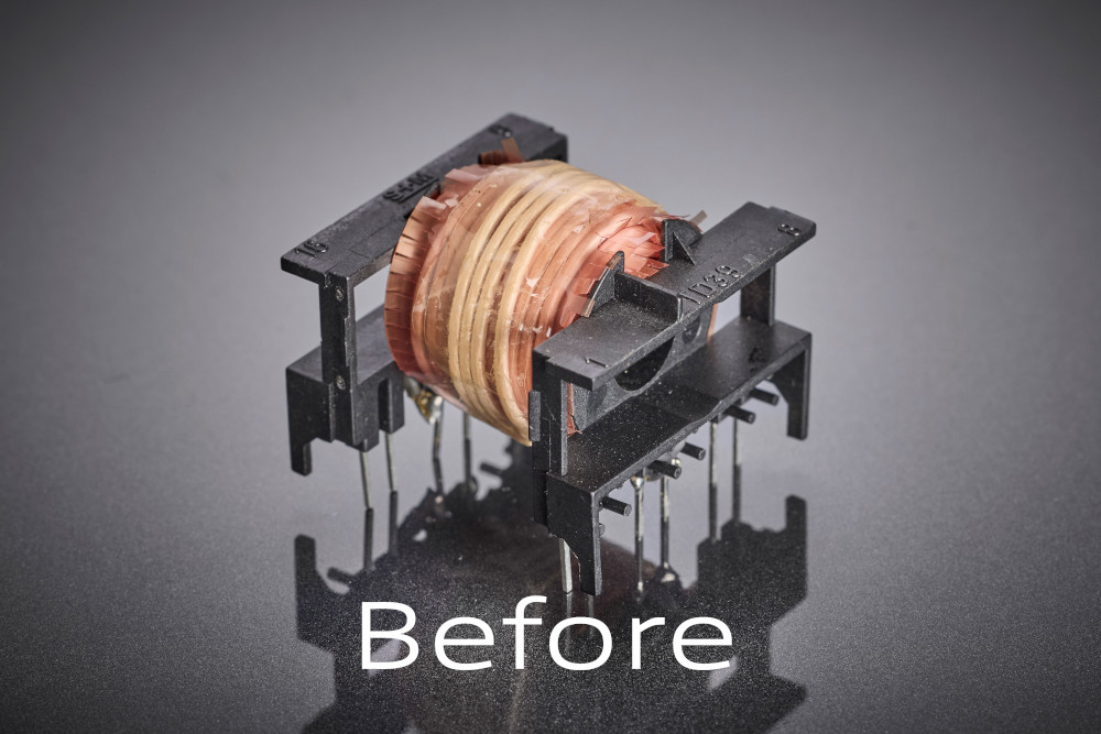 The original transformer winding with conventional conductor geometry shows structural limits at high switching frequencies: increased AC losses, higher heating, and limited efficiency in a compact format.
