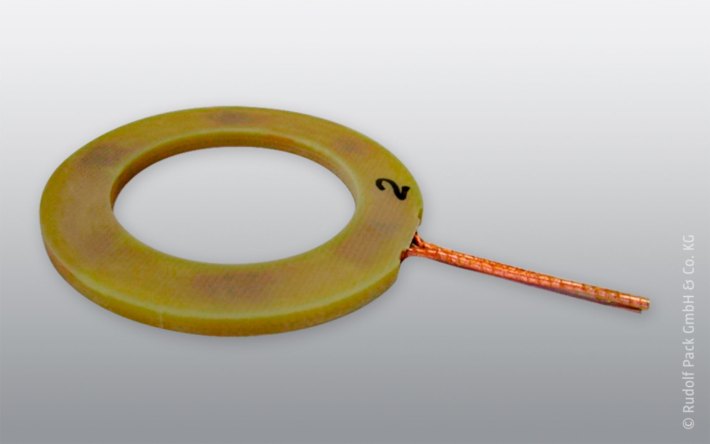 Ring-shaped printed circuit board with integrated copper litz wire as an experimental setup for investigating current distribution and electromagnetic behavior.